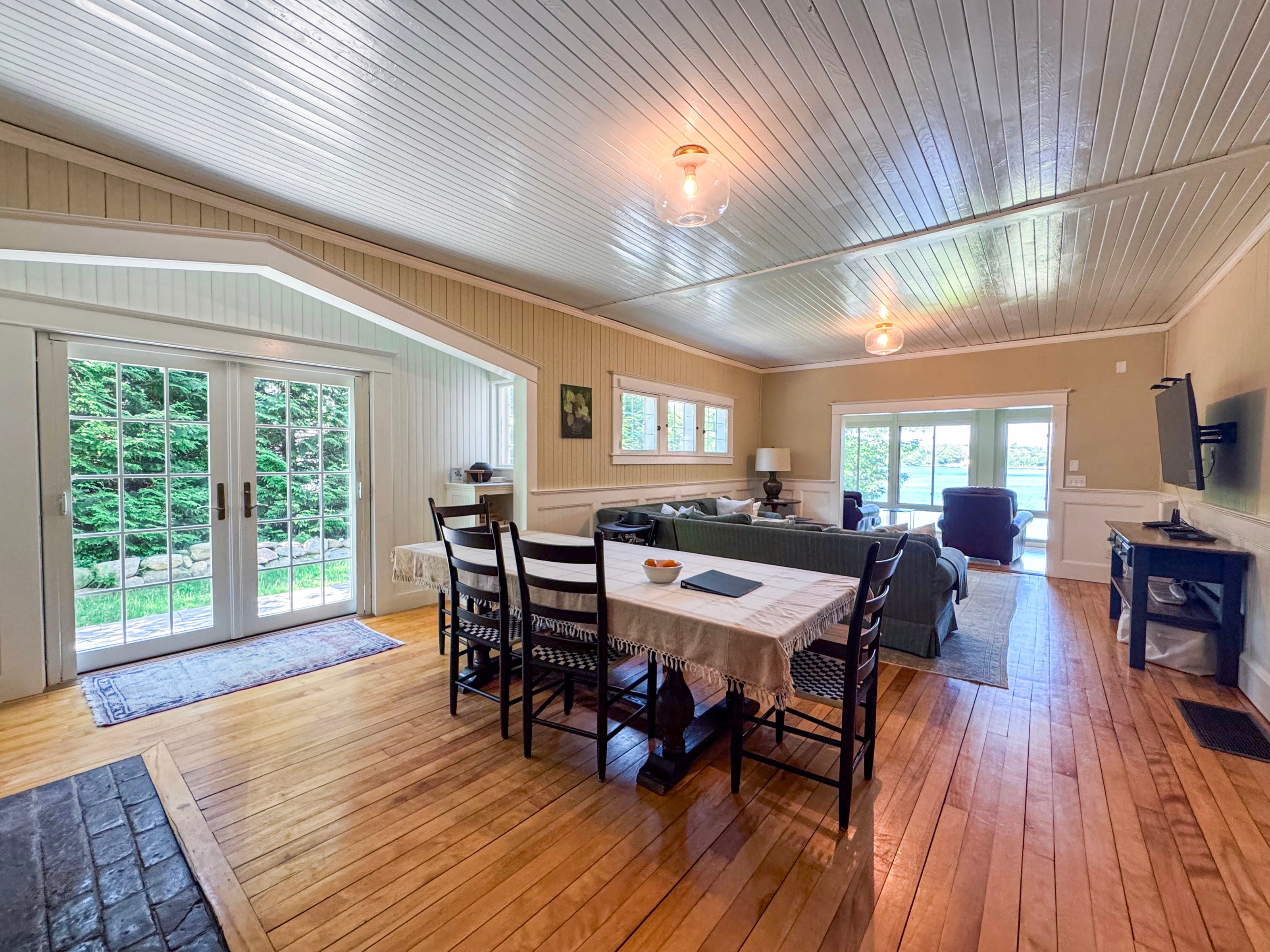 Sunroom dining over the lake